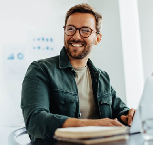 Man with Glasses Smiling